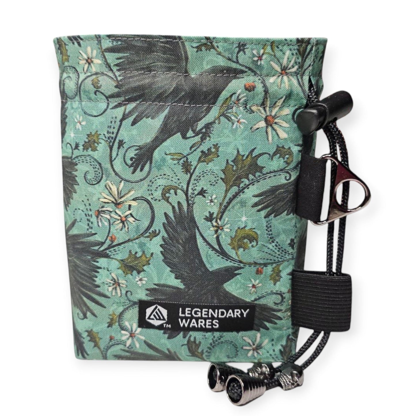 Legendary Wares Ravenflight dice bag with a teal background featuring flying ravens and floral patterns. Includes drawstring closure.